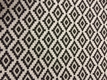 Grijze tricot van katoen met zwart fantasie motiefje wieber. Mooi voor jurk, rokje, shirt, tuniek, legging, relaxbroek enz. 9,95 pm