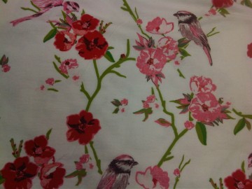 Tricot van katoen, wit met bloemen en vogels