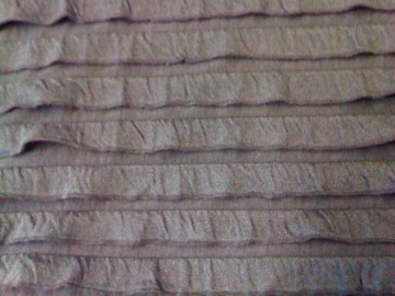 Zwarte tricot met laagjes, voor een appart effect